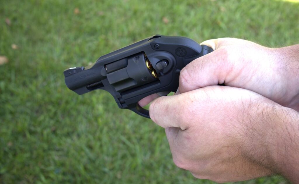 ruger lcr 9mm revolver in a firing grip